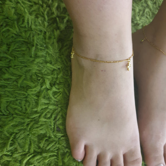 Tobillera con 3 aleatorios en Cruz Gold.