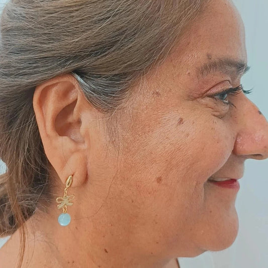 Pendientes lazos🎀 con Aletorio piedra Aguamarina Gold.