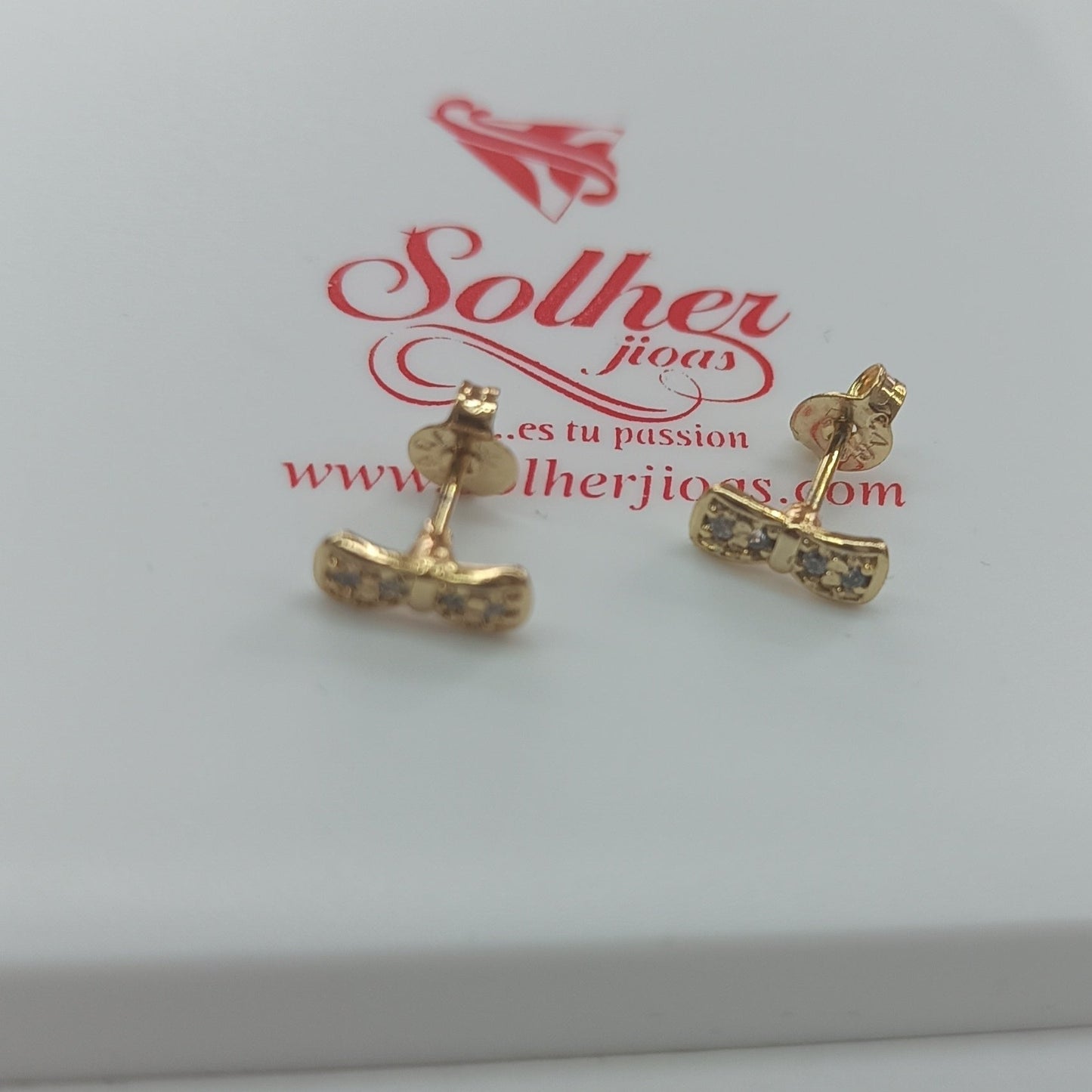 Pendientes 🎀 lazos con Mini Circonitas finas Translúcido .