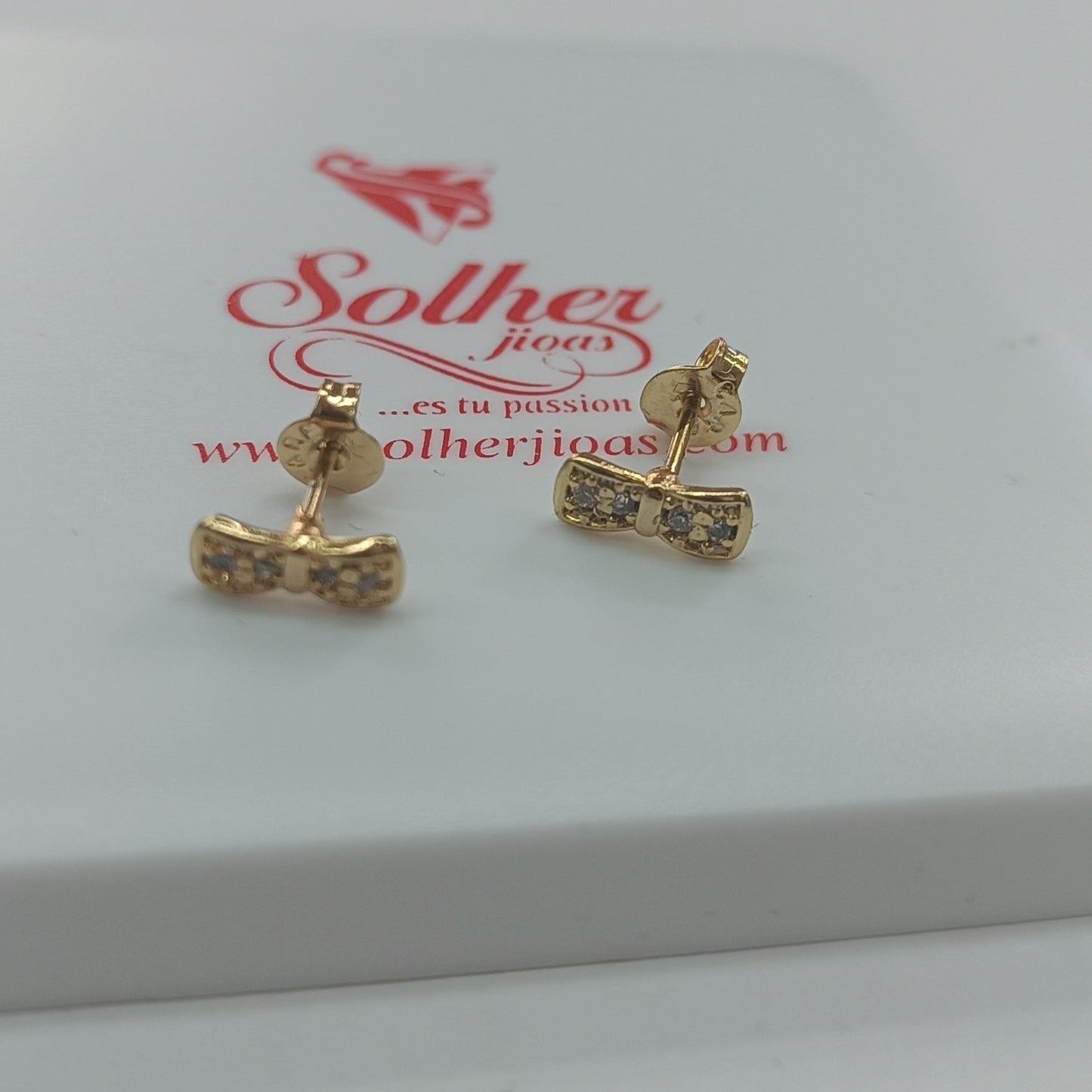 Pendientes 🎀 lazos con Mini Circonitas finas Translúcido .