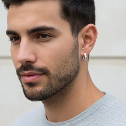 ARGOLLAS PLATA 925 ARO FACETADO IRREGULAR BRILLO RODIO.