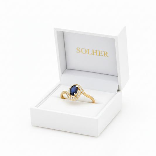 Anillo en 100% Oro de 18 Kl. con zafiro fino y circonitas.