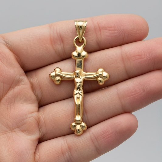 Cruz con cristo en Oro de 18 Kl.  Medidas de la cruz: 17x28mm.