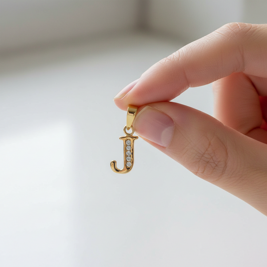 Colgante inicial de la A - Z  100% Oro de  18 kt.