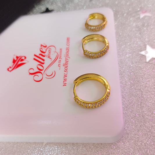 Argollas Trio  con Circonitas finas Gold.