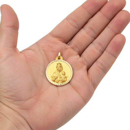 Medalla Virgen del Carmen en 100% Oro amarillo de 18 Kl con borde tallado  22 mm.