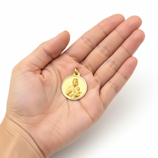 Medalla Virgen del Carmen en 100%  Oro amarillo de 18 Kl con borde tallado. 20 mm.
