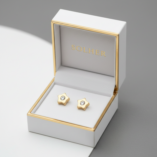 Pendientes de estrellas para bebe 100% Oro de 18 Kl. con circonitas.  Cierre de rosca.6mm.