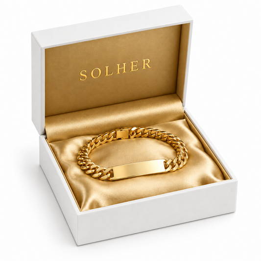 Pulsera hueca en 100% Oro de 18 Kl. con placa. Eslabón barbado.