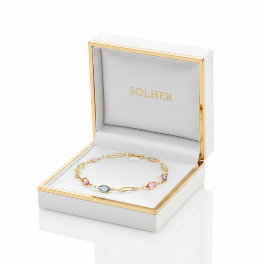 Pulsera LAURA 100% en Oro de 18 Kl. con jaula y piedras en diferentes colores.