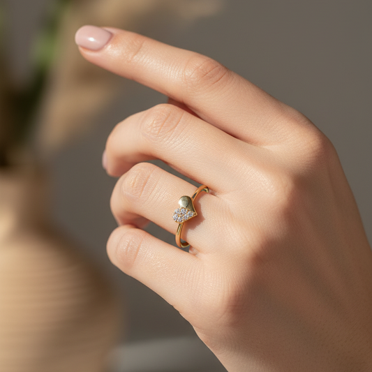 Sortija corazón en 100% Oro de 18 Kl. con circonitas.