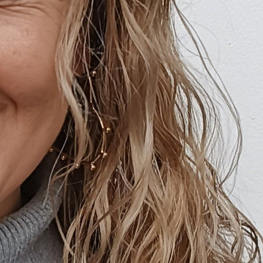 Argollas T.L Corazon Con Nueve Balines  Gold.